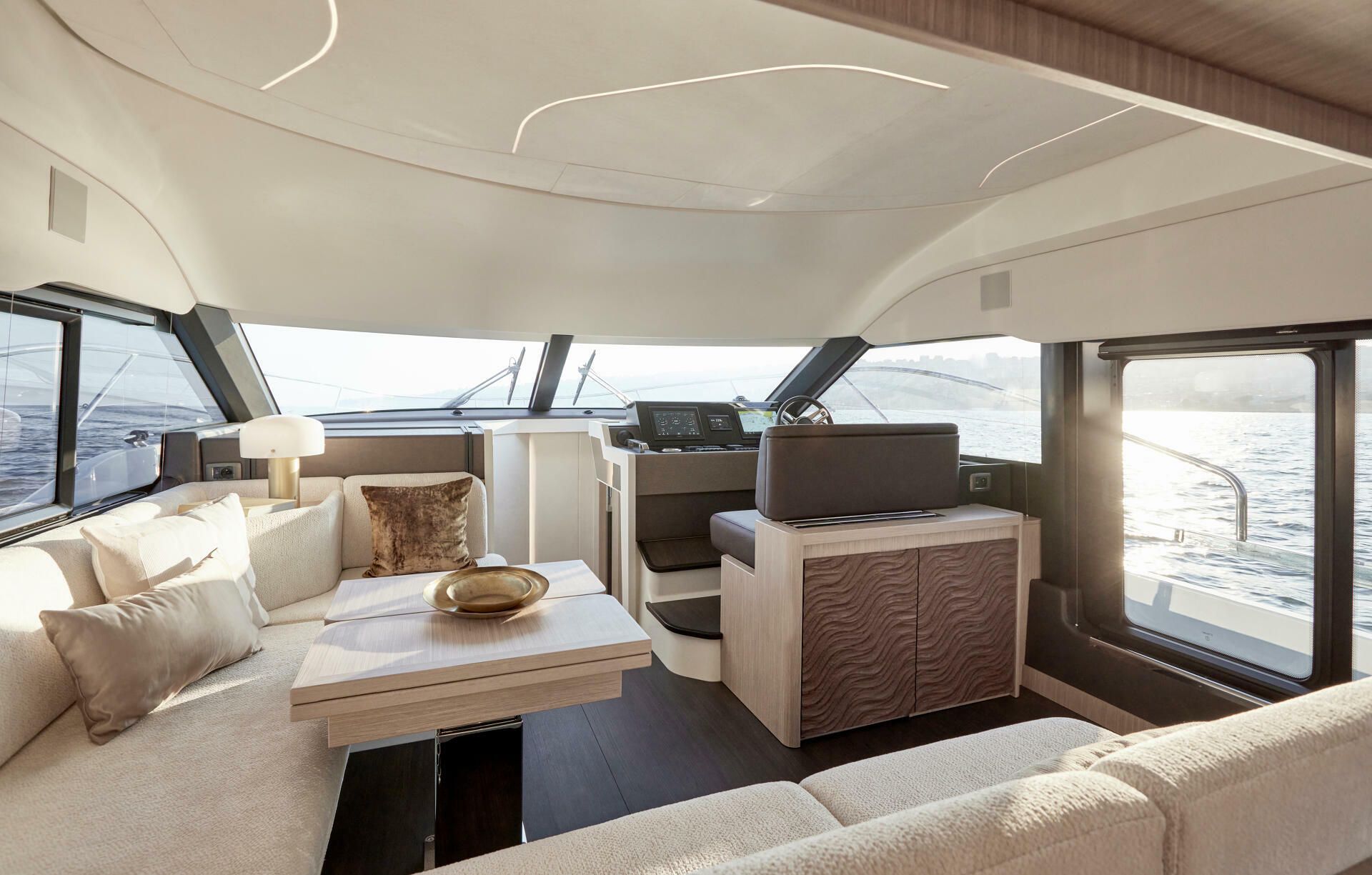 Jeanneau-Yacht-Prestige-F4.9-marseille-yacht-mediterranee00008 a room with a table and chairs On yacht Prestige F4.9 Marseille