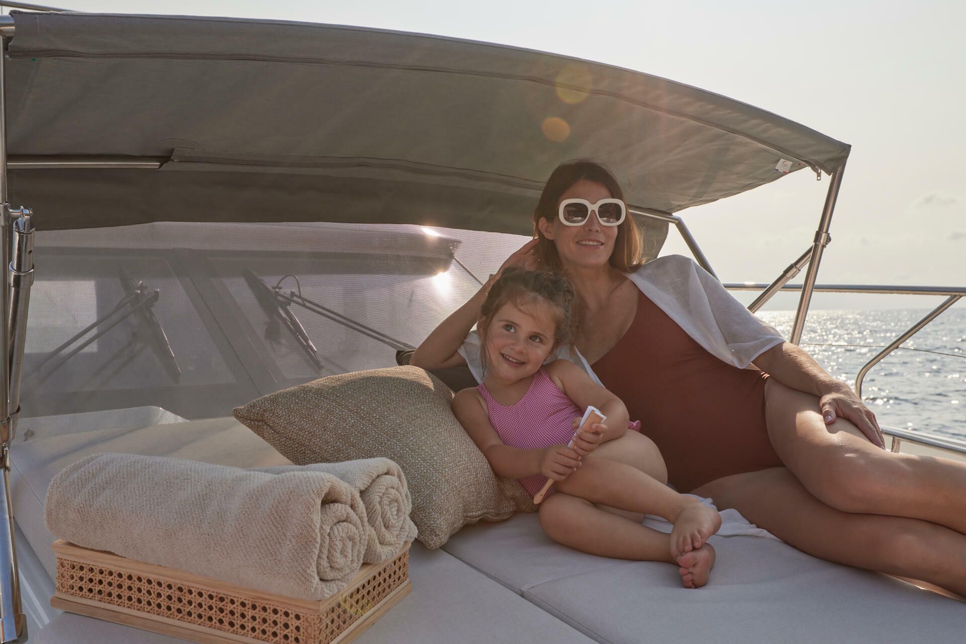 Jeanneau-Yacht-Prestige-F4.9-marseille-yacht-mediterranee00023 a woman and a child on a boat yacht Prestige F4.9 Marseille